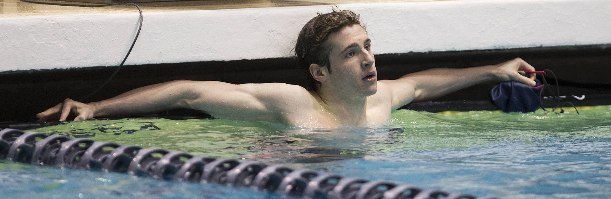 Glacier Peak’s Matthew King relaxes after breaking the 4A state record, previously set in 1992, in the 100-yard freestyle during the state swim and dive championships on Saturday at the Federal Way Aquatic Center. (Andy Bronson / The Herald)