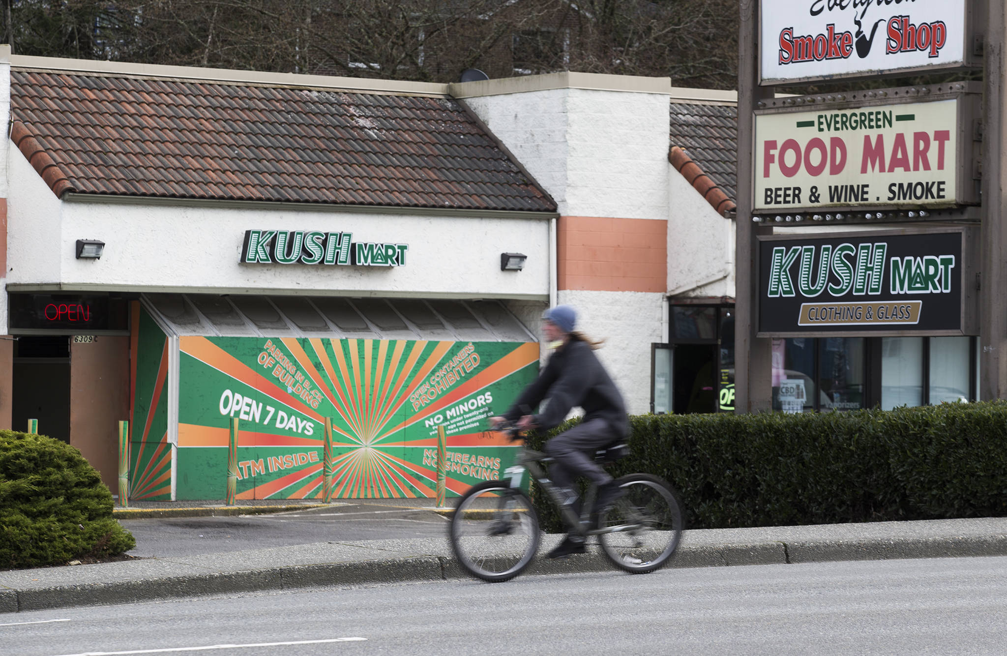 Five retail cannabis stores, including KushMart on Evergreen Way seen here Tuesday, operate in Everett. But 10 are allotted by the state. The Everett City Council is considering allowing up to eight marijuana shops, even as a mystery flyer opposing that expansion has circulated through city mailboxes. (Andy Bronson / The Herald)