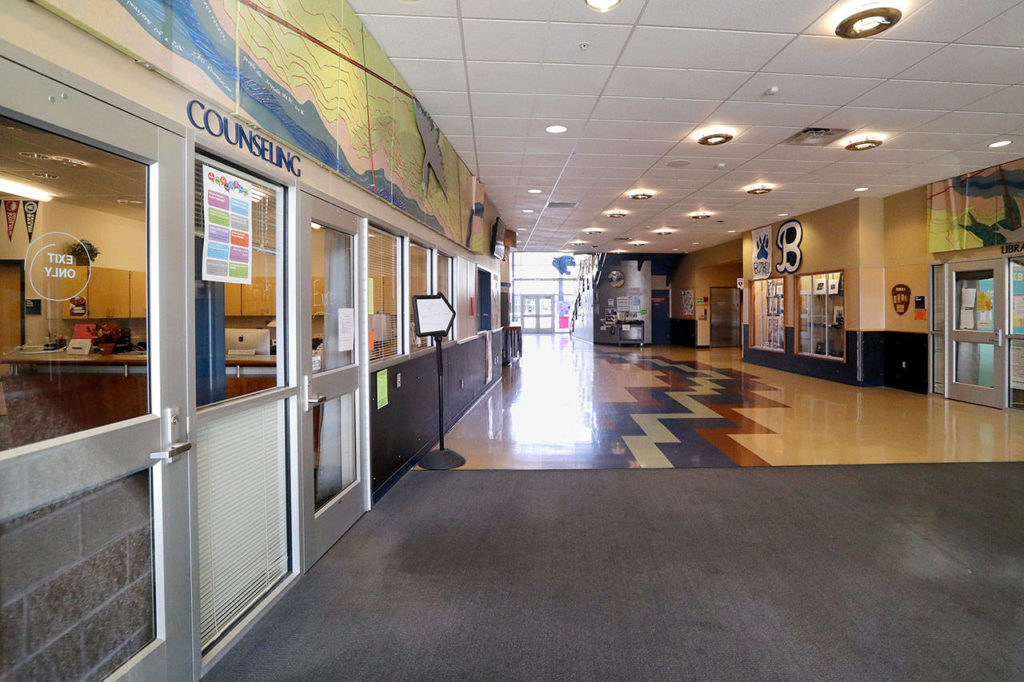 The halls inside Bothell High School, closed for the day, stand empty Thursday. (AP Photo/Elaine Thompson)

