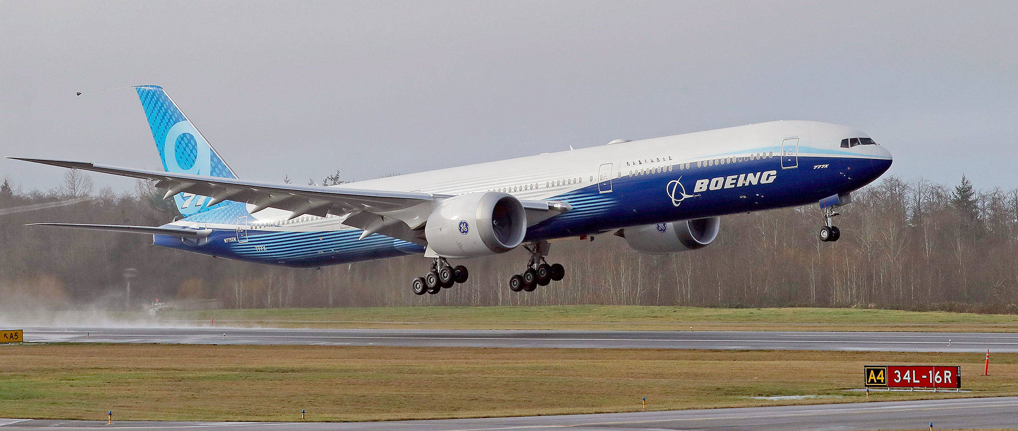 The first Boeing 777X takes off at Paine Field on Jan. 25 in Everett. (AP Photo/Ted S. Warren)