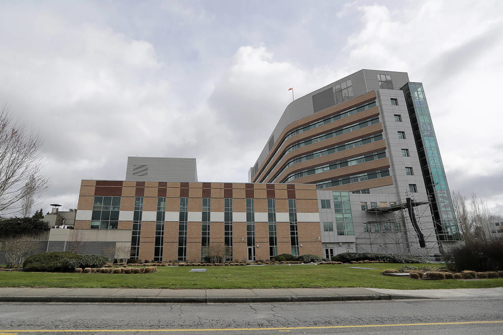 EvergreenHealth Medical Center in Kirkland, where a person infected with COVID-19 died. (AP Photo/Elaine Thompson) 
