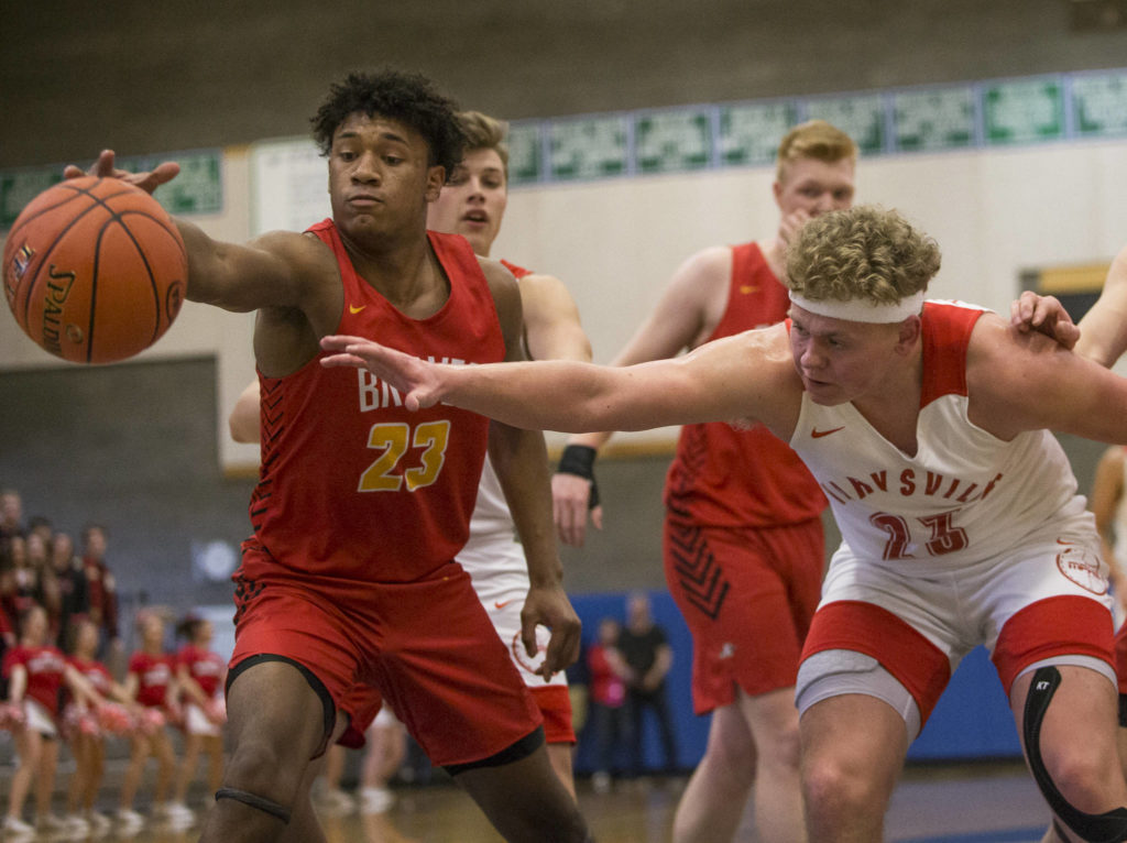 Kamiakin’s Messiah Jones outreaches Marysville Pilchuck’s Cameron Stordahl for the ball during the game against Kamiakan on Saturday, Feb. 29, 2020 in Shoreline, Wa. (Olivia Vanni / The Herald)
