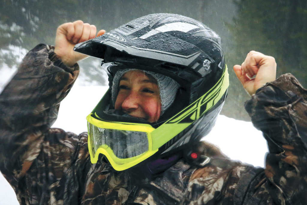 Candace Wiebe exults during a ride through Snohomish County’s foothills near Gold Bar. (Kevin Clark / The Herald)
