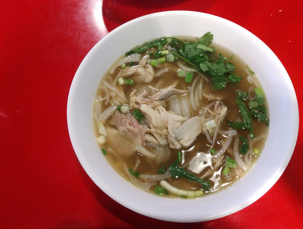 Most bowls of pho at Pho Country House in Lynnwood costs $9.96, including the chicken pho. (Sara Bruestle / The Herald)
