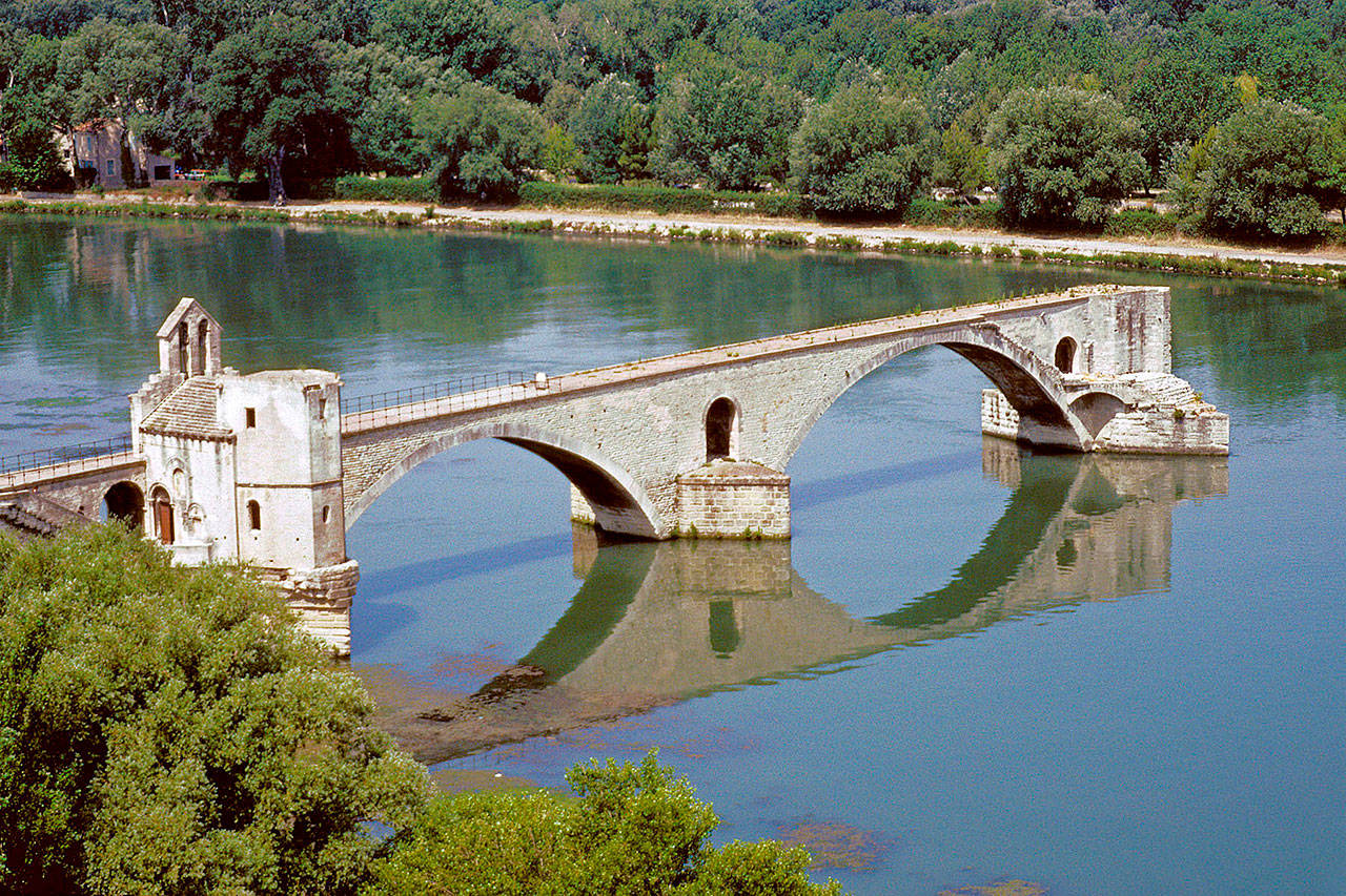 Built in the 12th century, the St. Benezet Bridge lasted until 1668 when a devastating flood took out most of the half-mile-long span. Tourists can pay to walk out on the bridge for a sweeping view of Avignon. (Rick Steves’ Europe)