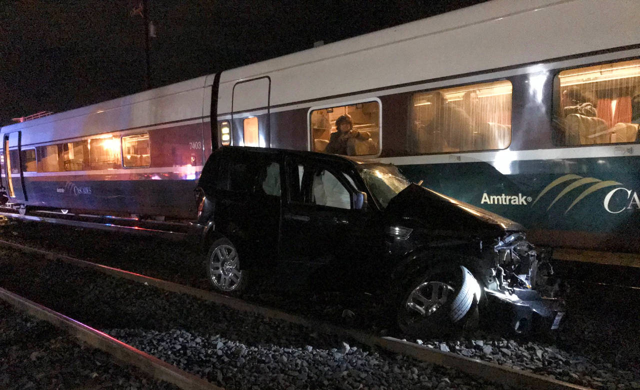 Four people, including three children between 2 and 7 years old, were hurt after their SUV collided with an Amtrak train Saturday night on 8th Street in Marysville. (Marysville Fire)