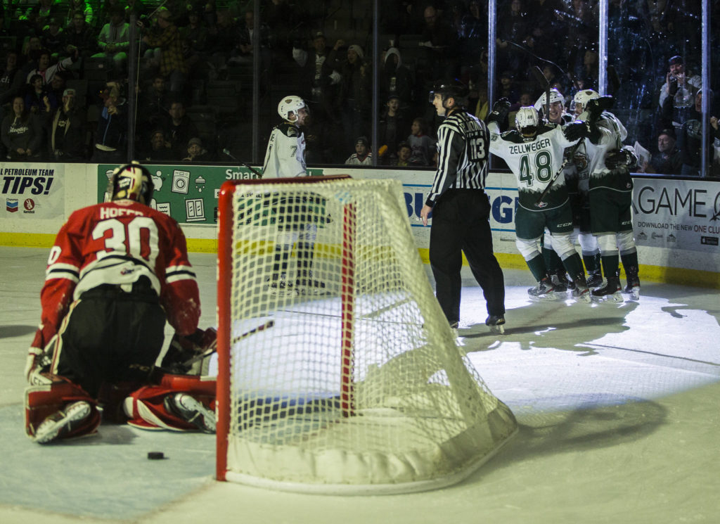 The Silvertips gather around Ty Kolle after his goal during the game against the Portland Winterhawks on Sunday, March 1, 2020 in Everett, Wa. (Olivia Vanni / The Herald)
