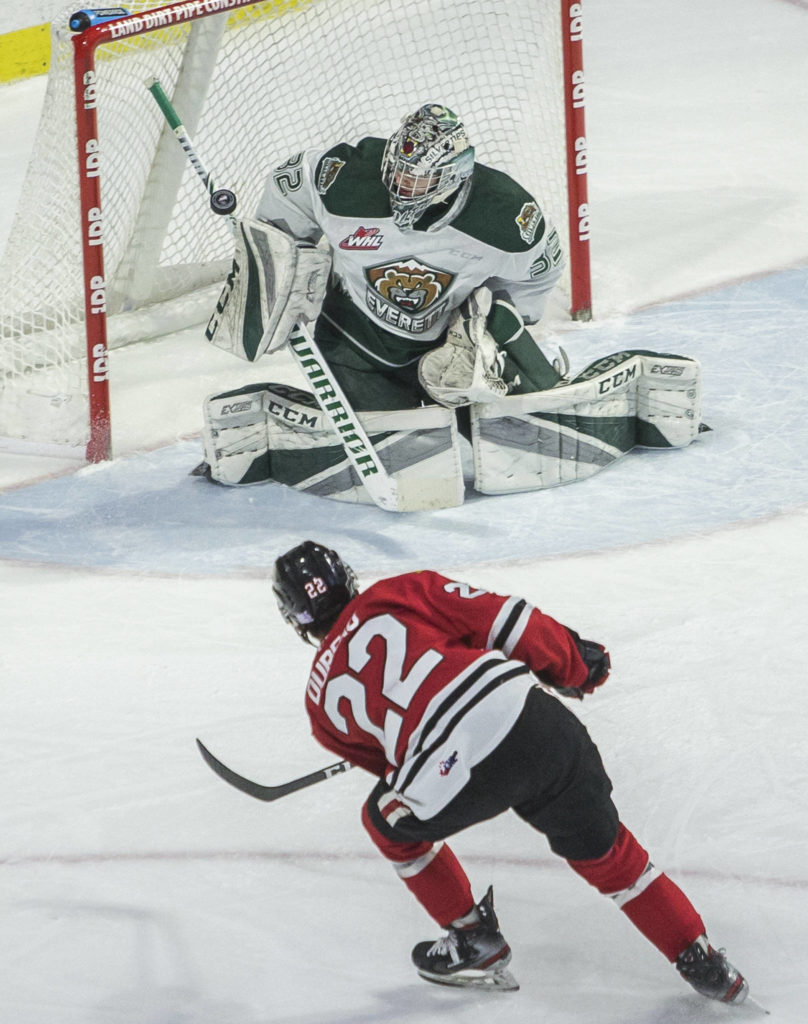 Silvertips’ Dustin Wolf blocks a shot by Winterhawks’ Jaydon Dureau during the game against the Portland Winterhawks on Sunday, March 1, 2020 in Everett, Wa. (Olivia Vanni / The Herald)
