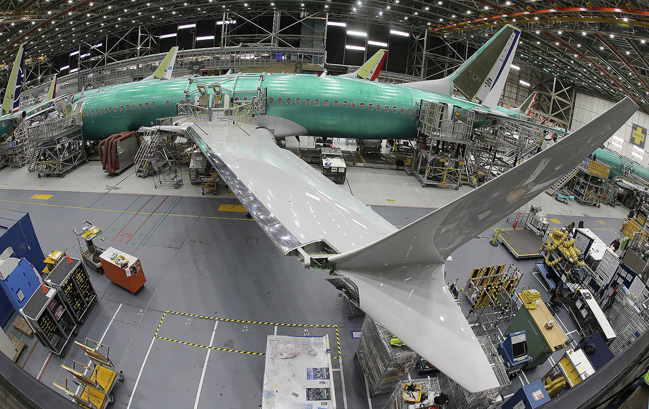 In this March 2019 photo, a Boeing 737 Max 8 airplane sits on the assembly line during a brief media tour in Boeing’s 737 assembly facility in Renton. (AP Photo/Ted S. Warren, File)