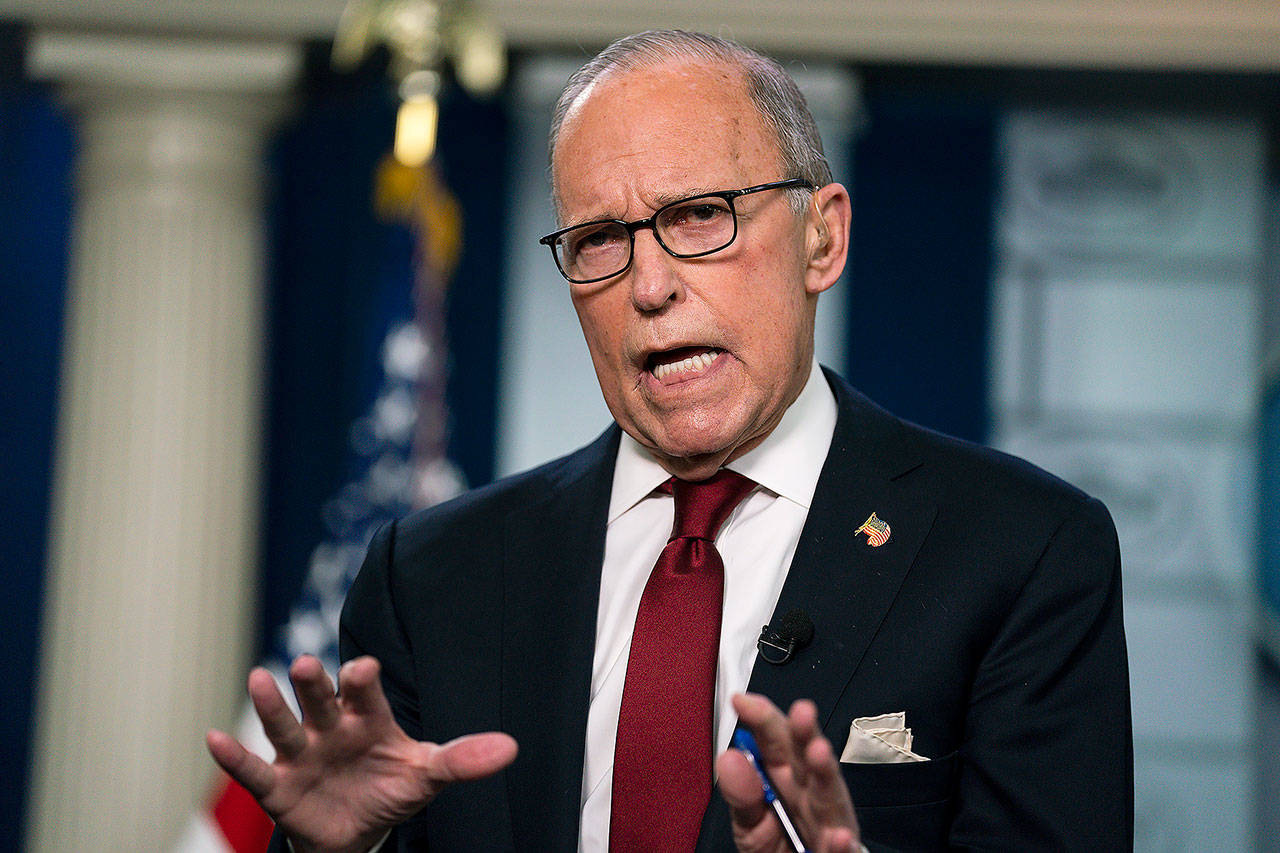 White House chief economic adviser Larry Kudlow talks with reporters about the impact of the Coronavirus on markets on Feb. 28 in Washington. (AP Photo/Evan Vucci)