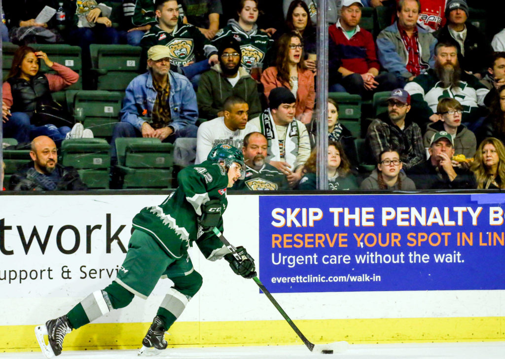 Everett’s Olen Zellweger controls the puck against the Saskatoon Blades Friday evening at Angel of the Winds Arena in Everett on November 22, 2019. The Silvertips will play Friday without fans due on-going concerns of the coronavirus pandemic. (Kevin Clark / The Herald)

