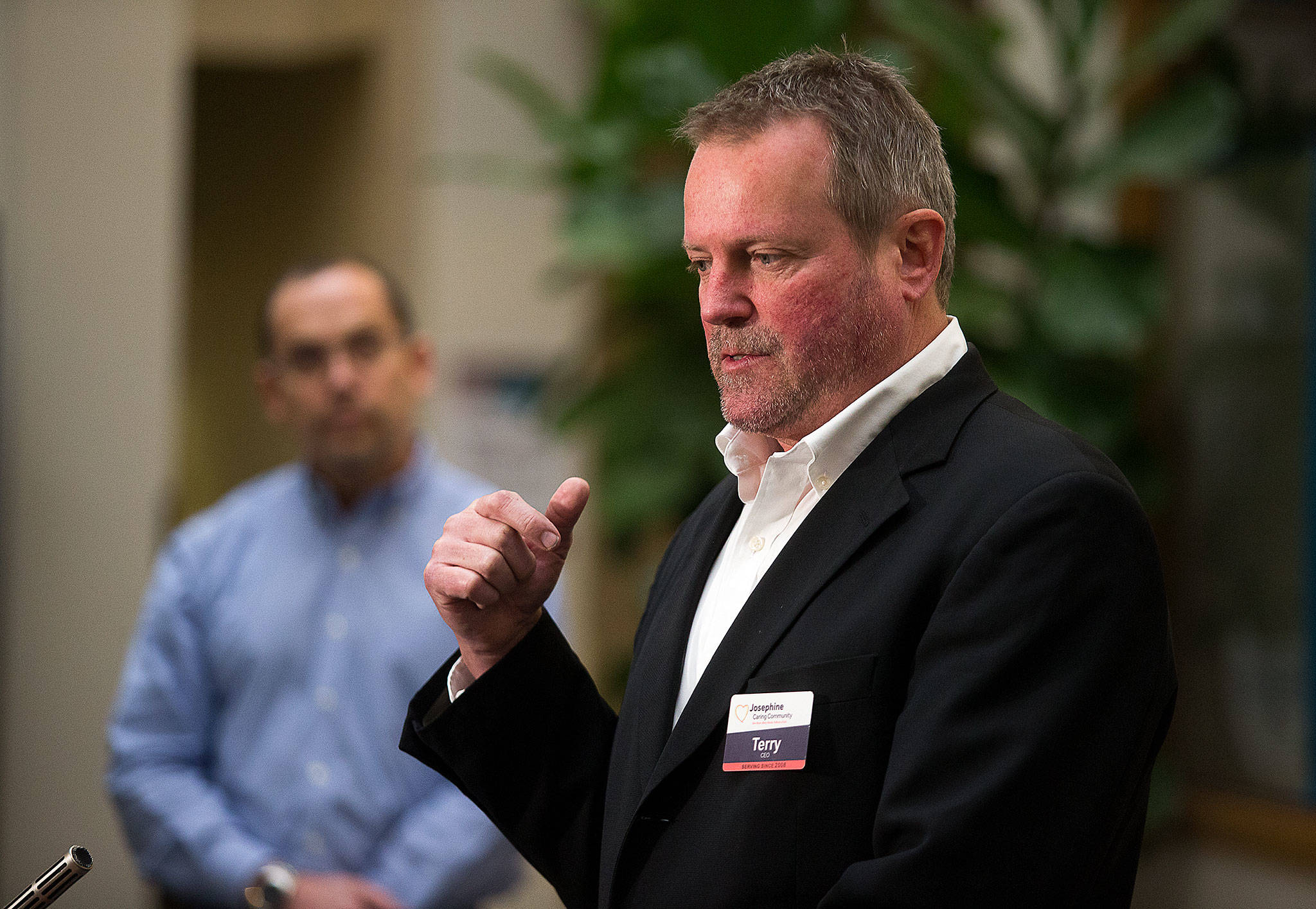 Terry Robertson, CEO of the Stanwood nursing home Josephine Caring Community, talks to members of the media during a press conference at the Snohomish Health District on Tuesday in Everett. Three cases of COVID-19 have been confirmed at the care home. (Andy Bronson / The Herald)