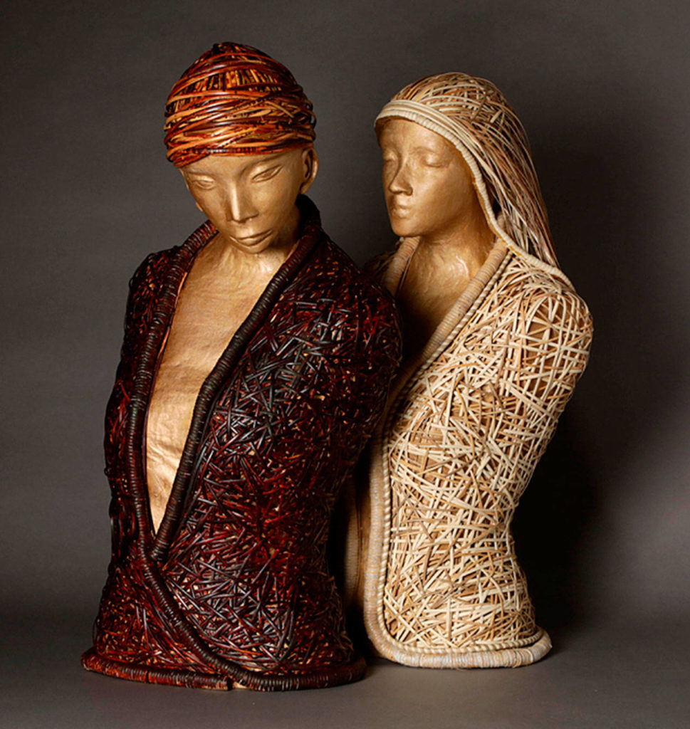 “She and They” by Nancy Loorem Adams of Langley is made of stone clay, paper mache, pigment and cane. (Michael Stadler)
