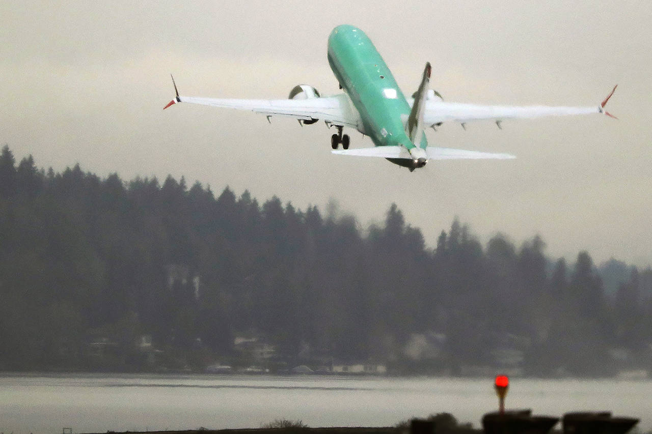 A Boeing 737 Max airplane being built for Norwegian Air International takes off on a test flight Dec. 11, 2019, at Renton Municipal Airport in Renton. (AP Photo/Ted S. Warren)