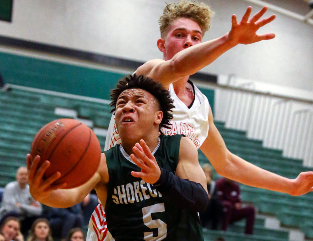 Shorecrest sophomore Elijah Johnson attempts a shot. (Kevin Clark / The Herald)
