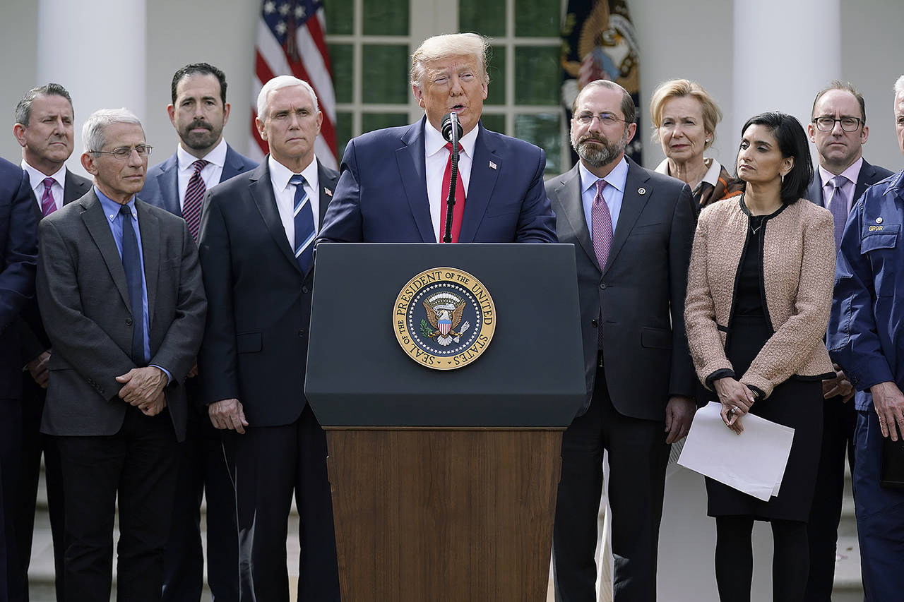 President Donald Trump speaks during a news conference about the coronavirus in the Rose Garden of the White House on Friday in Washington. (AP Photo/Evan Vucci)