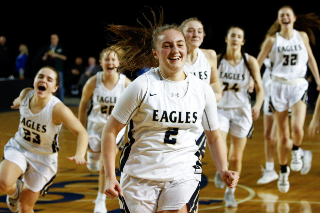 Arlington junior Hailey Hiatt celebrates her game-winner against Shorecrest in the state quarterfinals. (Kevin Clark / The Herald)
