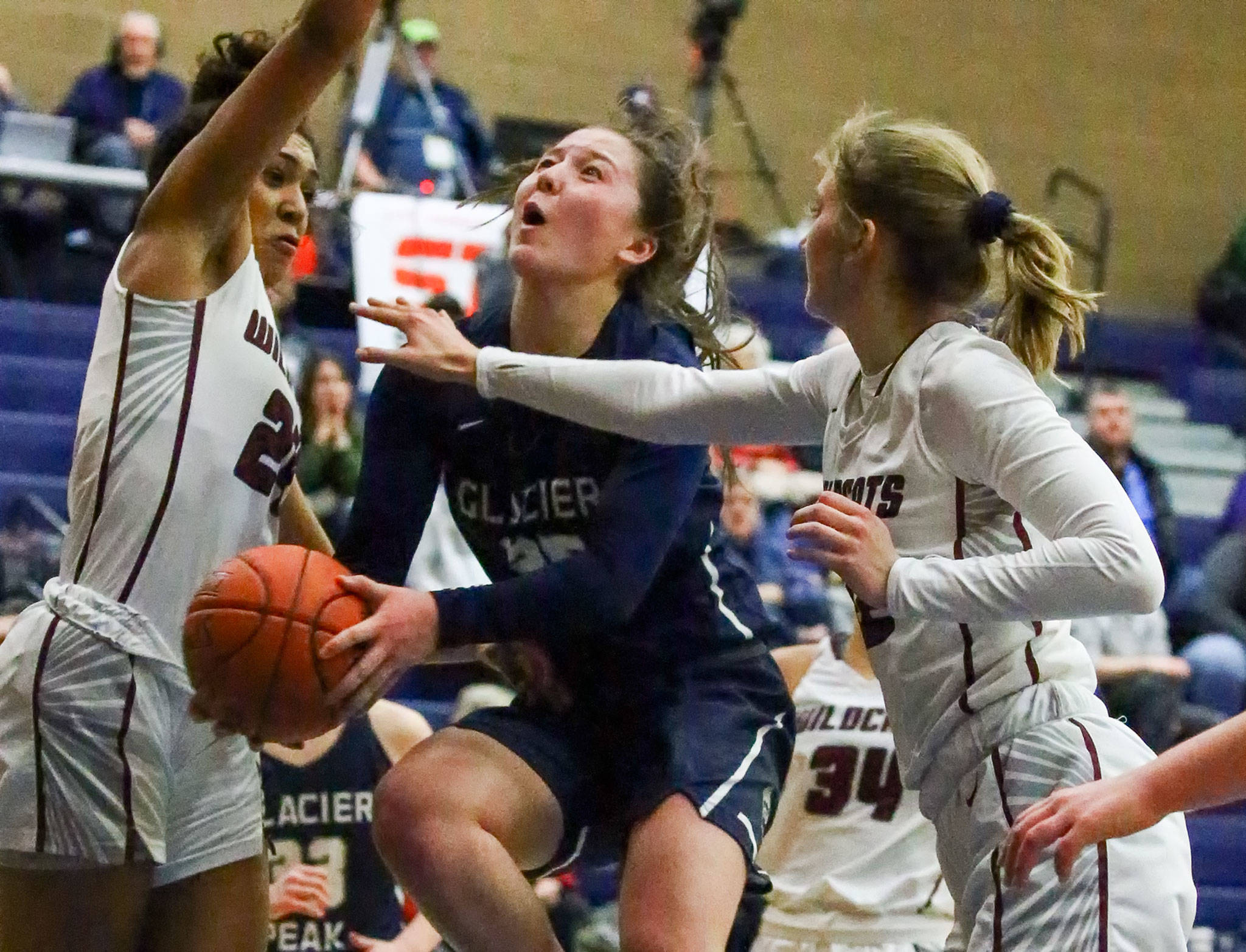Glacier Peak junior Maya Erling (middle) helped the Grizzlies go unbeaten in Wesco 4A play and claim a third-place state trophy. (Kevin Clark / The Herald)
