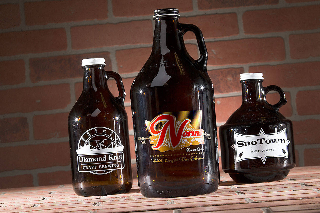 Many Snohomish County breweries don’t bottle their product. With mandatory closures, one way to help keep them in business is to call them up and order a growler to go. (Andy Bronson / Herald file)