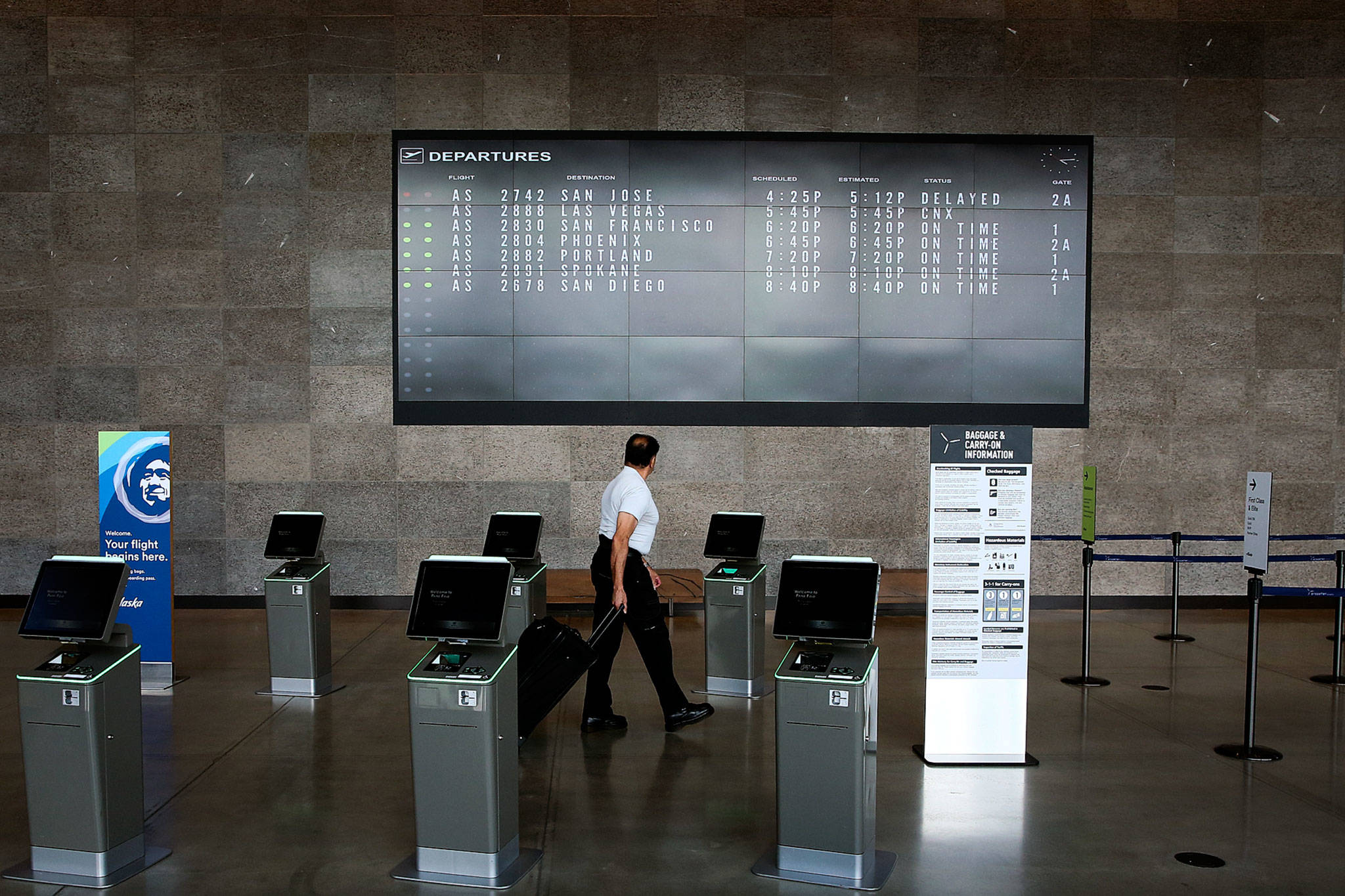 Low passenger turnout has caused many flight and route cancellations for Paine Field. (Kevin Clark / The Herald)