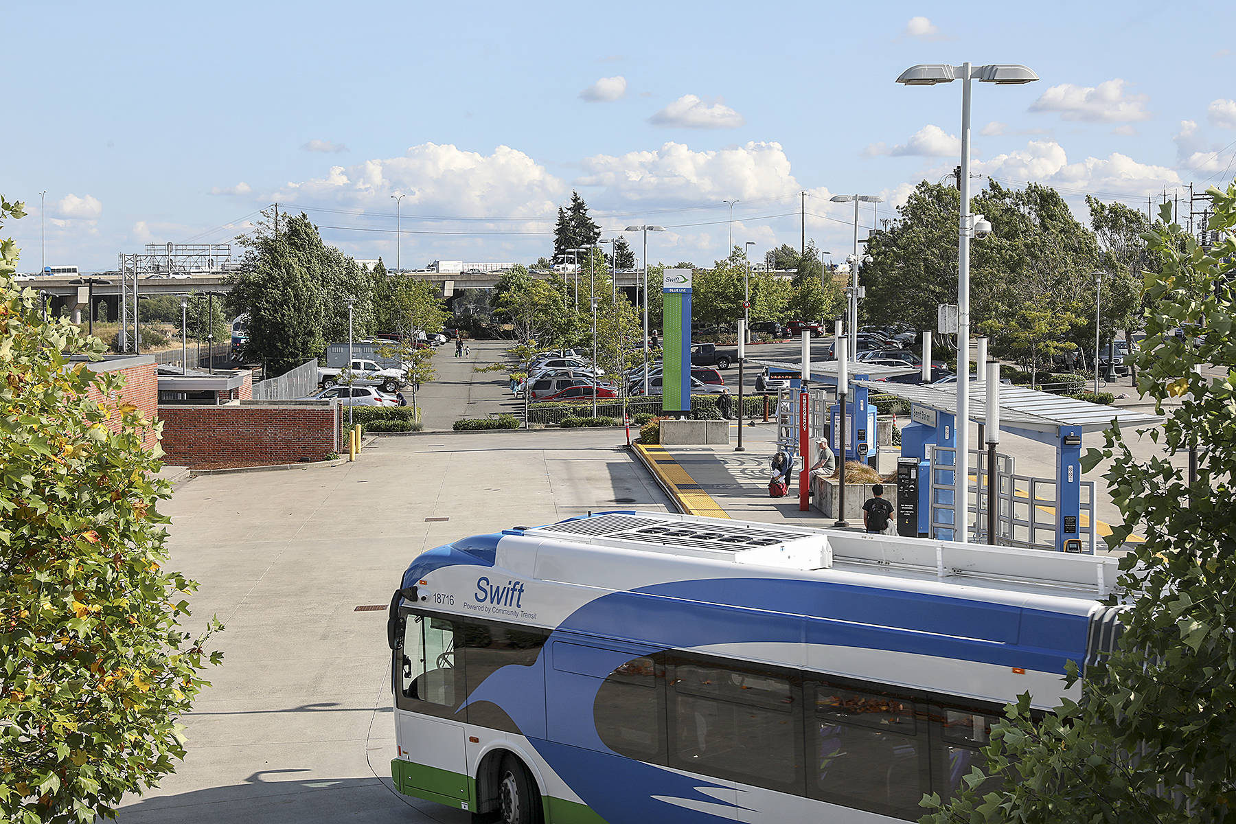 A Community Transit bus approaches a stop. (Lizz Giordano / Herald file)