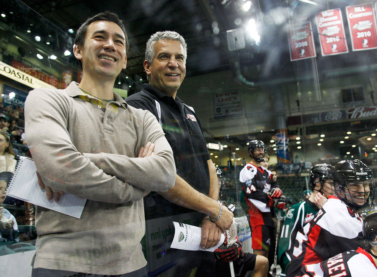 Herald reporter Nick Patterson (far left) coaches Team Dark during the inaugural Comcast Arena Classic benefit lacrosse game in February of 2013. (Genna Martin/The Herald)