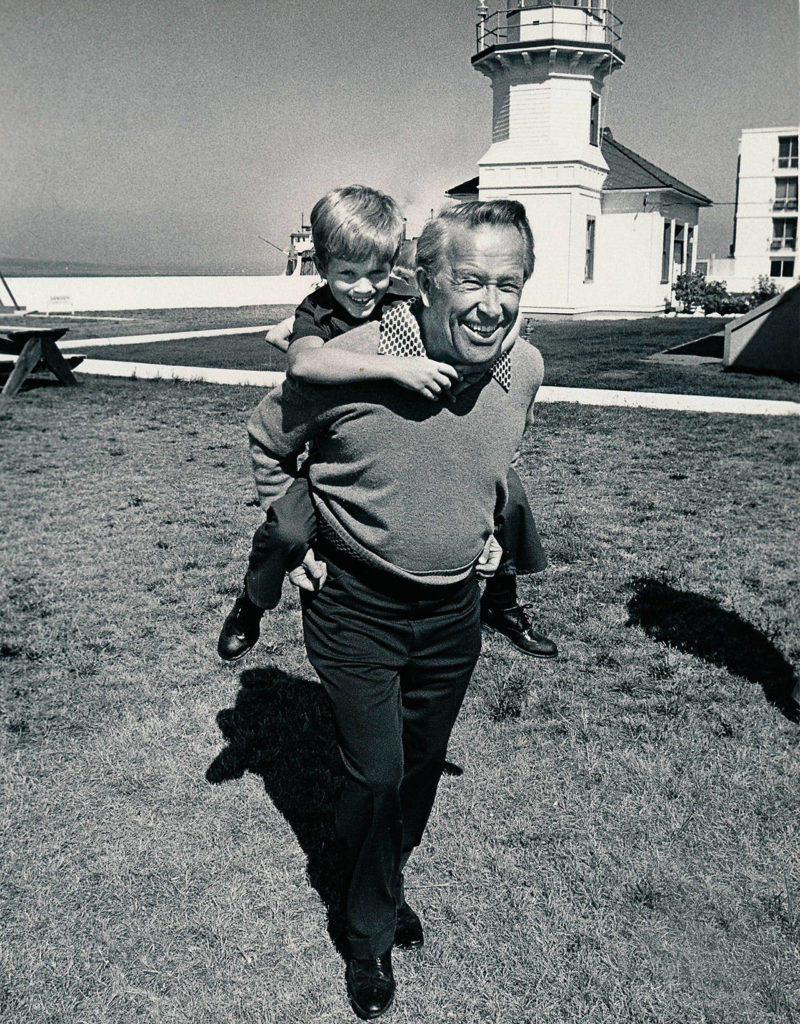 On a sunny day near Mukilteo Lighthouse Park, Peter enjoys a ride on his father’s back.
