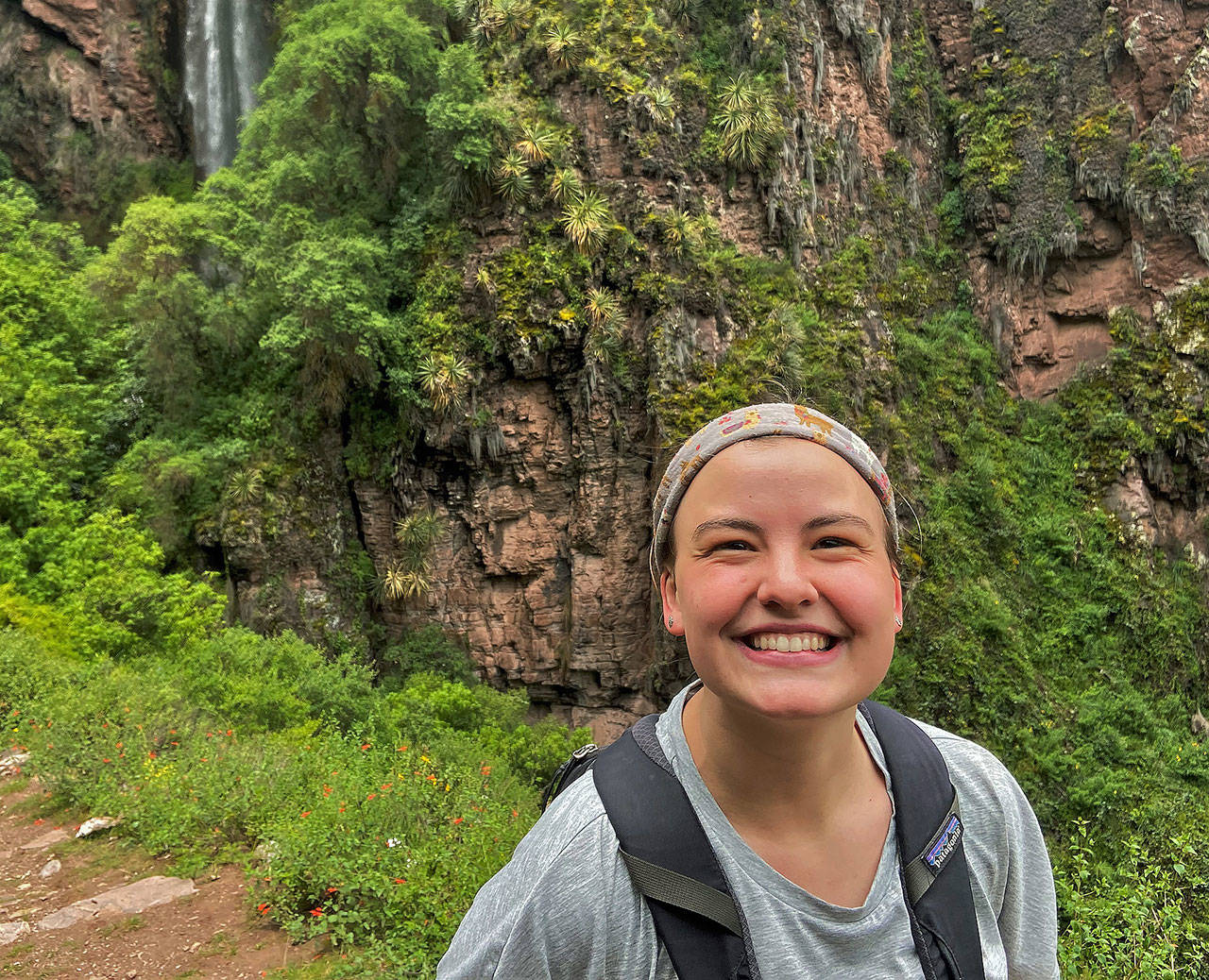 Caroline Overstreet during a hike to a waterfall in Peru. She was there serving with the Awamaki organization that serves Peruvian women. (Courtesy Caroline Overstreet)