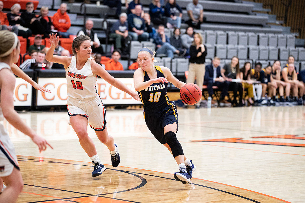 Mady Burdett of Whitman, a former Edmonds-Woodway High School standout, drives to the basket against a Wheaton defender during a game in the 2020 NCAA Division III women’s basketball tournament. (Whitman College photo)