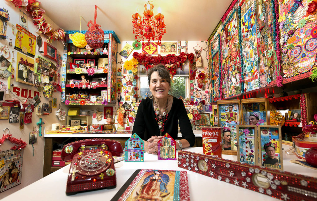 Melissa Halferty in her Frida Kahlo-themed craft room at home on Wednesday in Everett. (Andy Bronson / The Herald)
