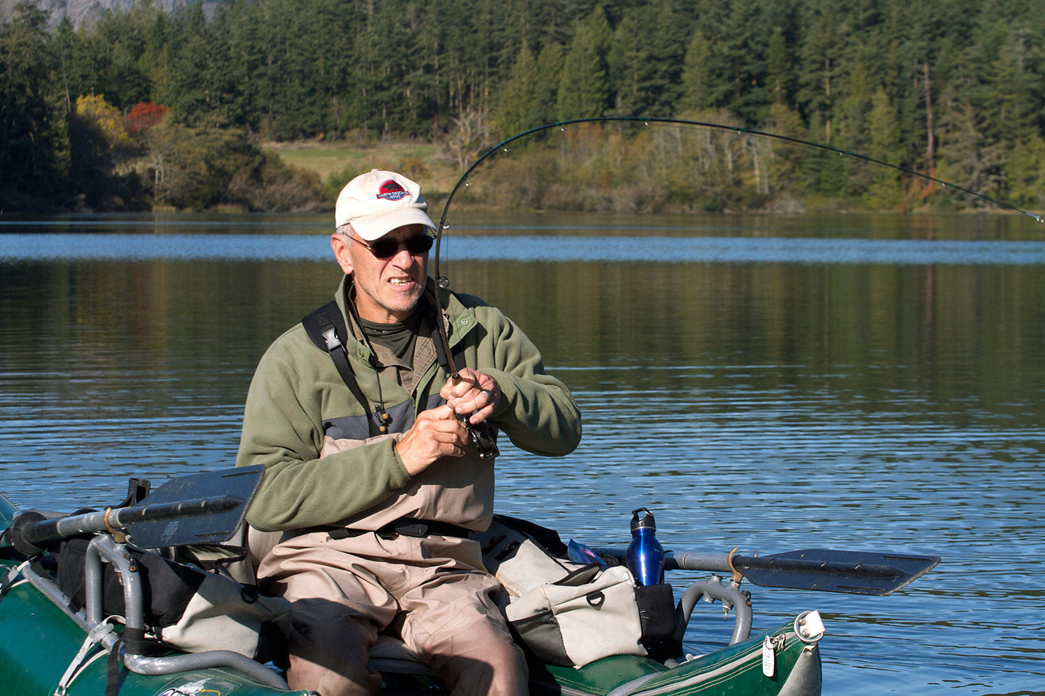 A rainbow trout caught in deeper water puts up a good fight at Pass Lake. (Mike Benbow)