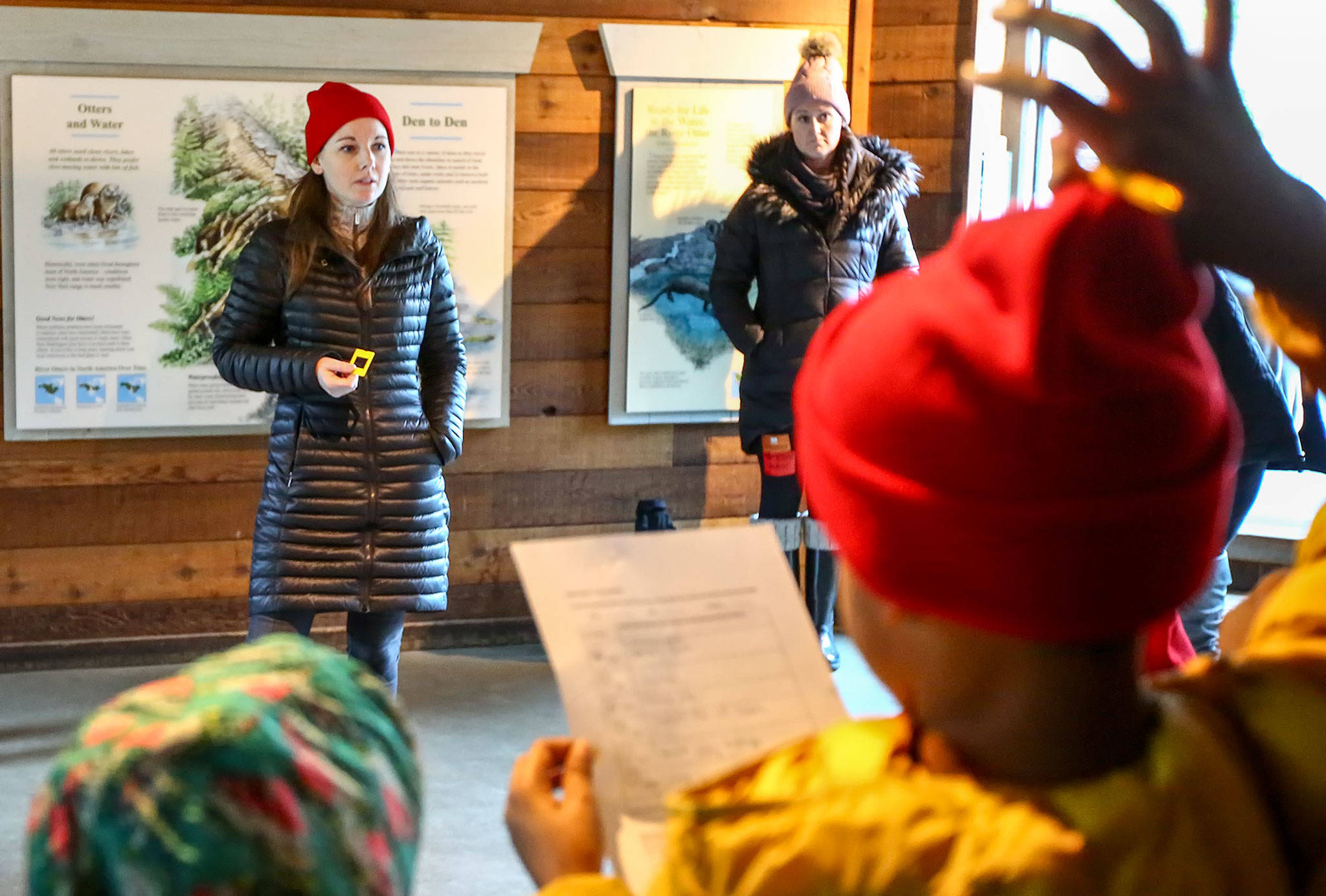 Jennie Warmouth fields questions during her trip to Seattle’s Woodland Park Zoo in December. (Kevin Clark / The Herald)