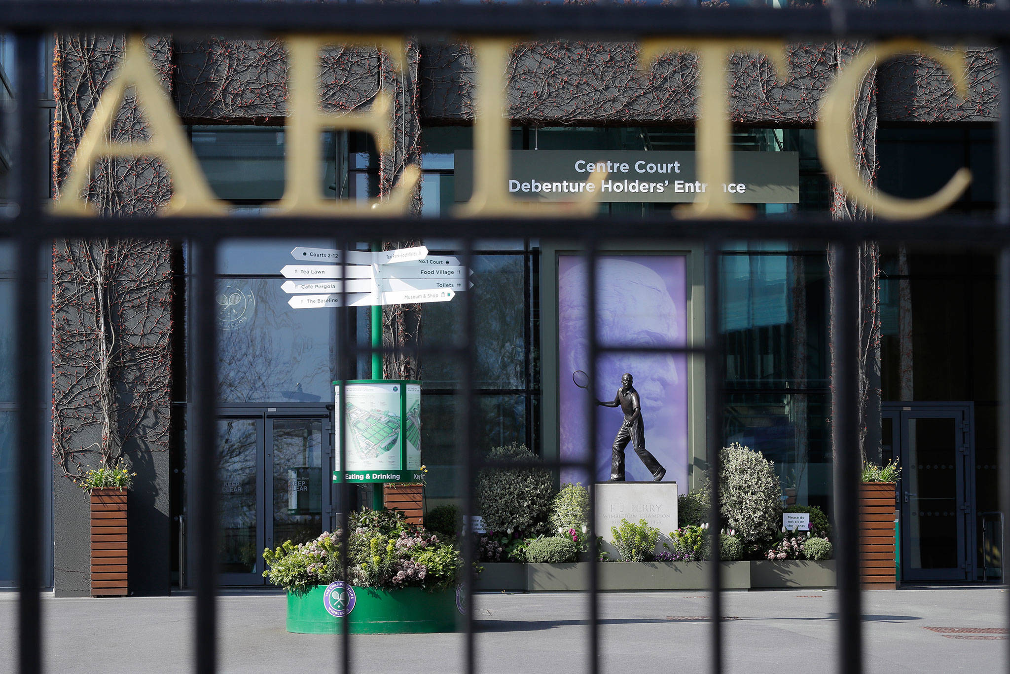 One of the main public entrances to All England Lawn Tennis and Croquet club in London where the Wimbledown tournament is held. (AP Photo/Kirsty Wigglesworth)