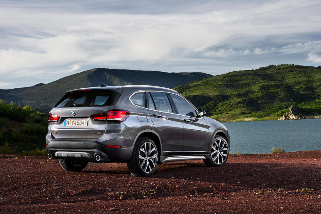 New tinted LED taillights with L-shaped light bars highlight the rear view of the 2020 BMW X1 compact crossover SUV. (Manufacturer photo)
