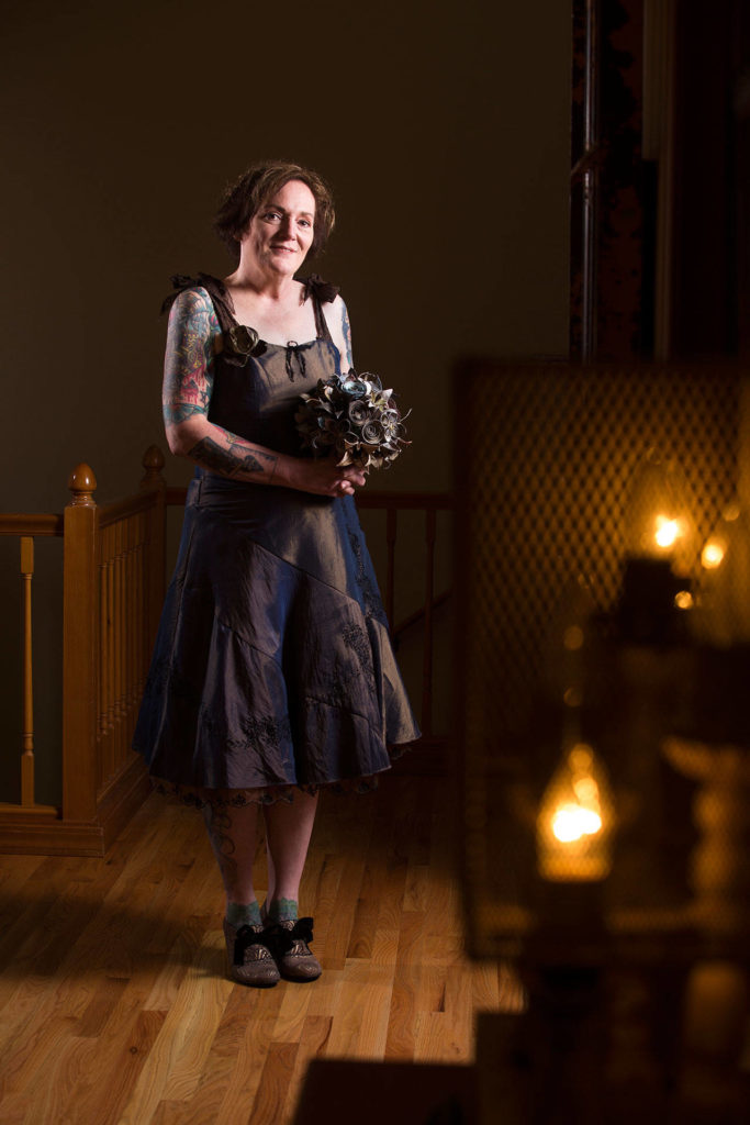 Christine Malone’s collection of industrial art inspired the steampunk-style dress she wore at her wedding. (Andy Bronson / The Herald)
