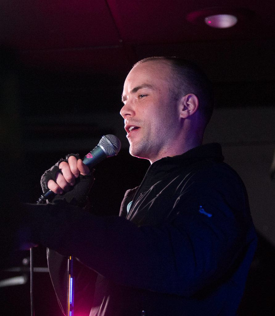 Comedy Garage co-host Blake Kiltoff performs a stand-up routine at Tony V’s in Everett. (Andy Bronson / Herald file)
