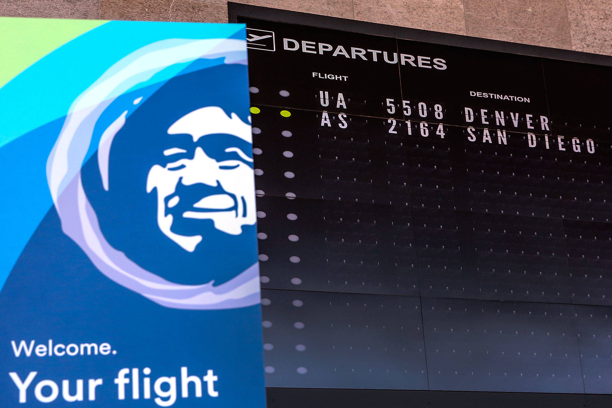 Alaska Airlines announced this week it is reducing the number of daily departures to four a day from the Paine Field terminal. (Kevin Clark / The Herald)