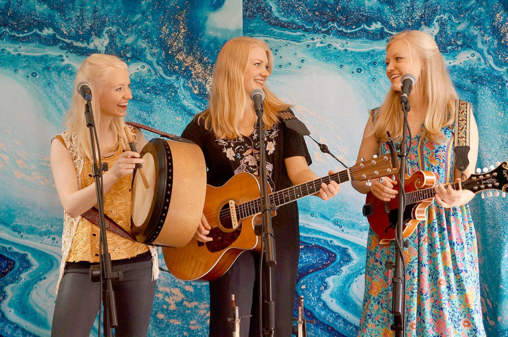 The Celtic-folk trio from Edmonds are recording mini concerts from their Edmonds home for fans to enjoy for free. (Gothard Sisters)
