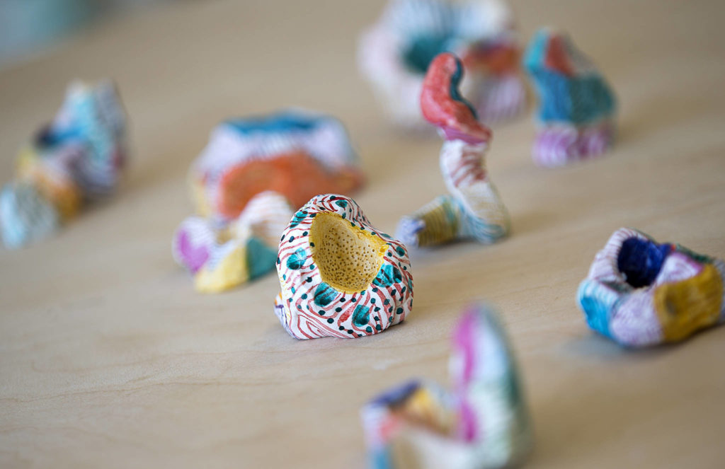 Everett artist Cat Snapp’s abstract sculptures made of Sculpey, a polymer clay material. (Andy Bronson / The Herald)
