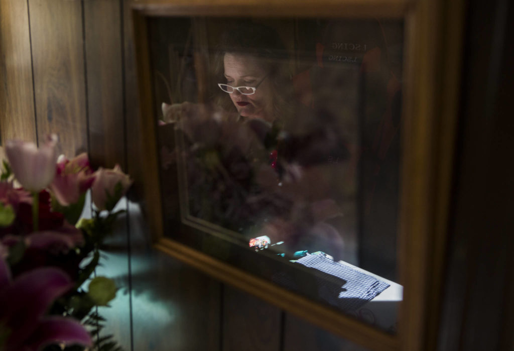 Nikki Speaks works on masks at her home on April 10 in Woodinville. (Olivia Vanni / The Herald)
