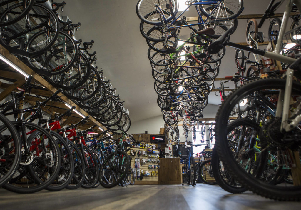 Bikes line the floors, wall and hang from the celling at the Bicycle Centres of Snohomish on Saturday in Snohomish. (Olivia Vanni / The Herald)
