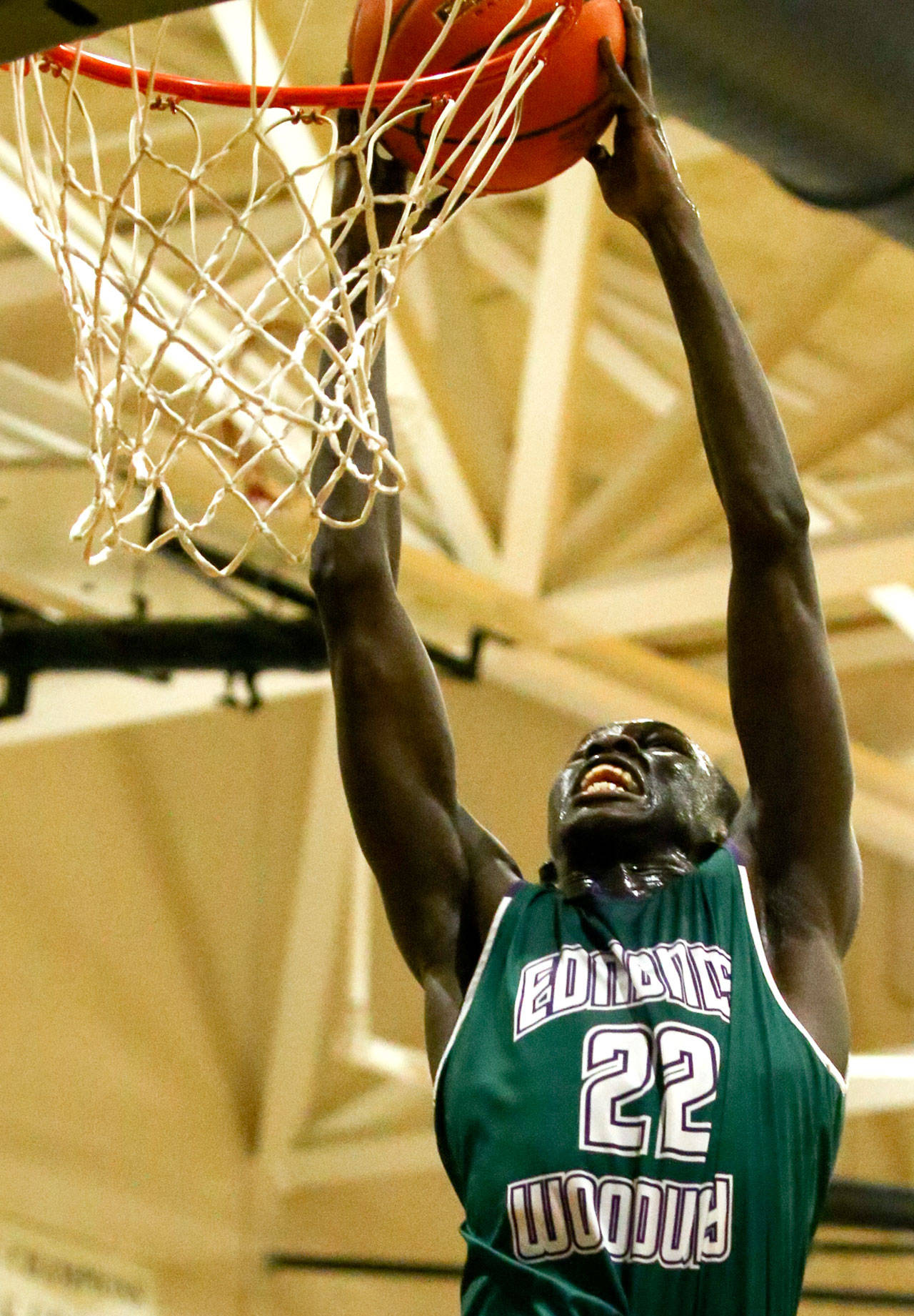 Edmonds-Woodway’s Mutdung Bol elevates for a dunk during a game against Meadowdale at Meadowdale High School on Jan. 24, 2019. (Kevin Clark / Herald file)