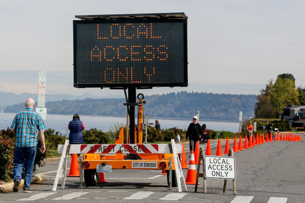 The city of Edmonds closed Sunset Avenue North to non-residential traffic, starting last Friday, because congestion was creating a hazardous situation for pedestrians. (Kevin Clark / The Herald)
