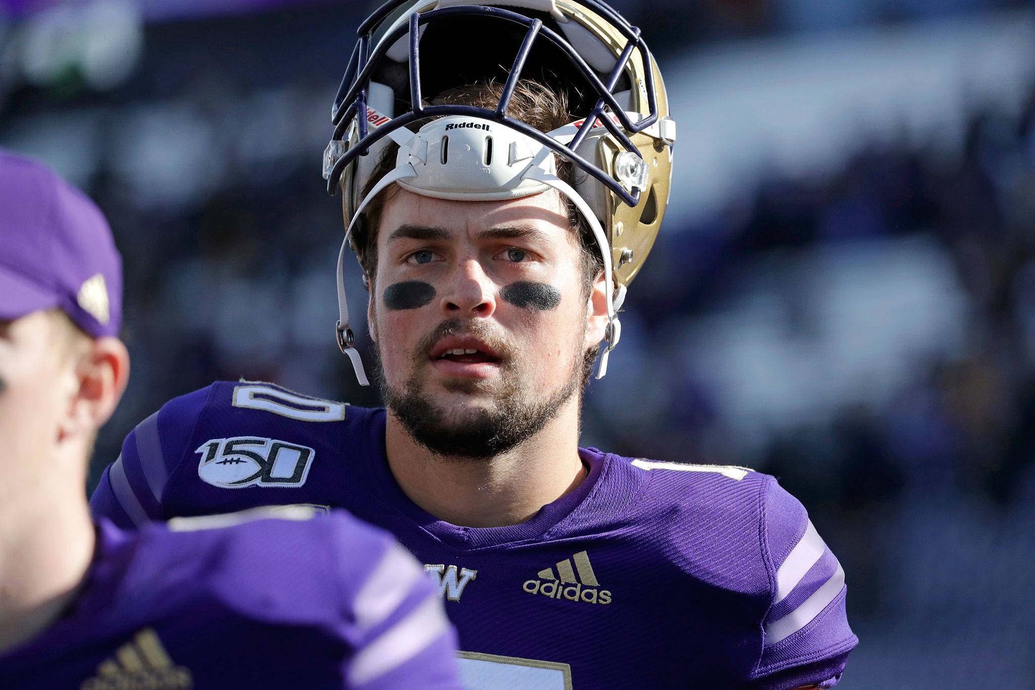 Washington quarterback Jacob Eason, a Lake Stevens alum, stands on the field after a game against Southern Cal on Sept. 28, 2019, in Seattle. (AP Photo/Elaine Thompson)
