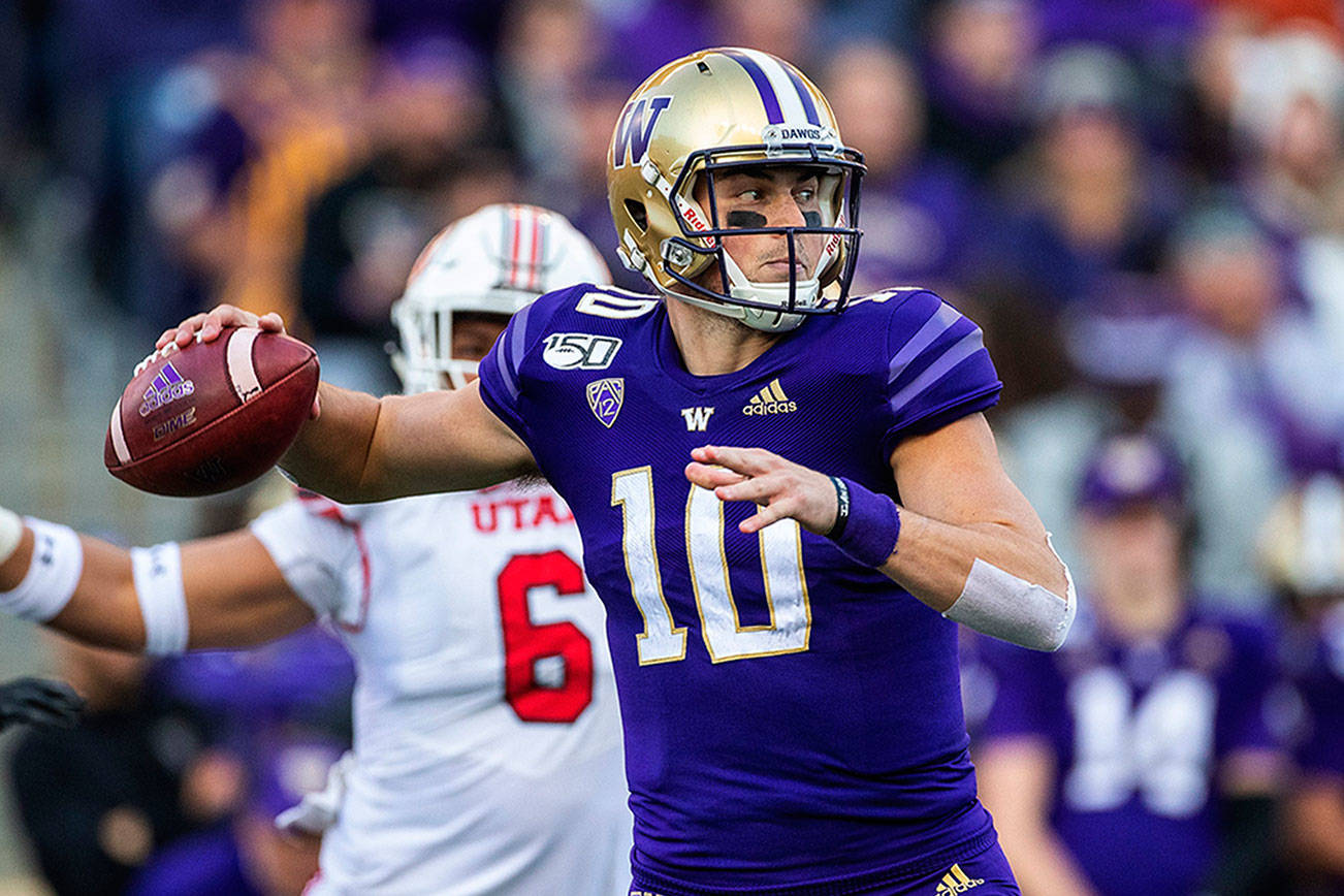 Lake Stevens High School graduate and University of Washington quarterback Jacob Eason is expected to be an early-round pick in the NFL draft, which begins Thursday. (Dean Rutz/Seattle Times/TNS)