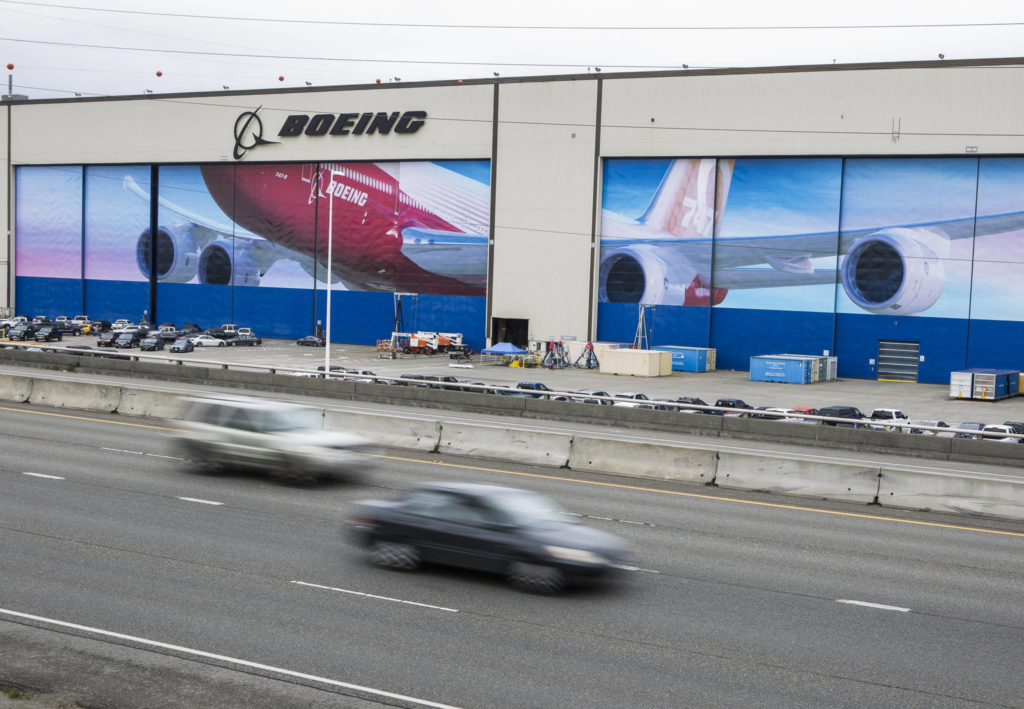 More than 27,000 Boeing workers return this week to their jobs at the Everett factory, shown here, and other facilities across the state. (Olivia Vanni / The Herald)
