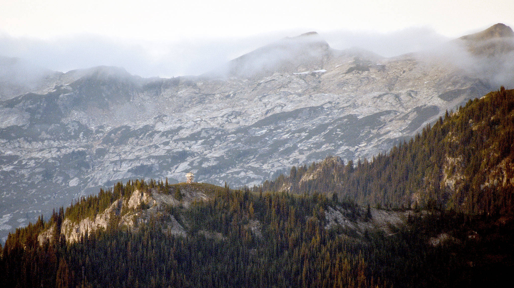 High above the Suiattle River valley, the Miners Ridge fire lookout sits on stilts at the western edge of its namesake. (Caleb Hutton / The Herald)