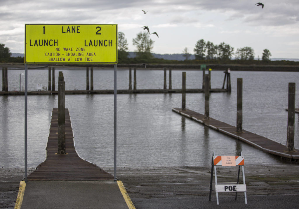 Some lanes at the 10th Street Boat Launch are closed, while others are open for essential boat traffic. (Olivia Vanni / The Herald)
