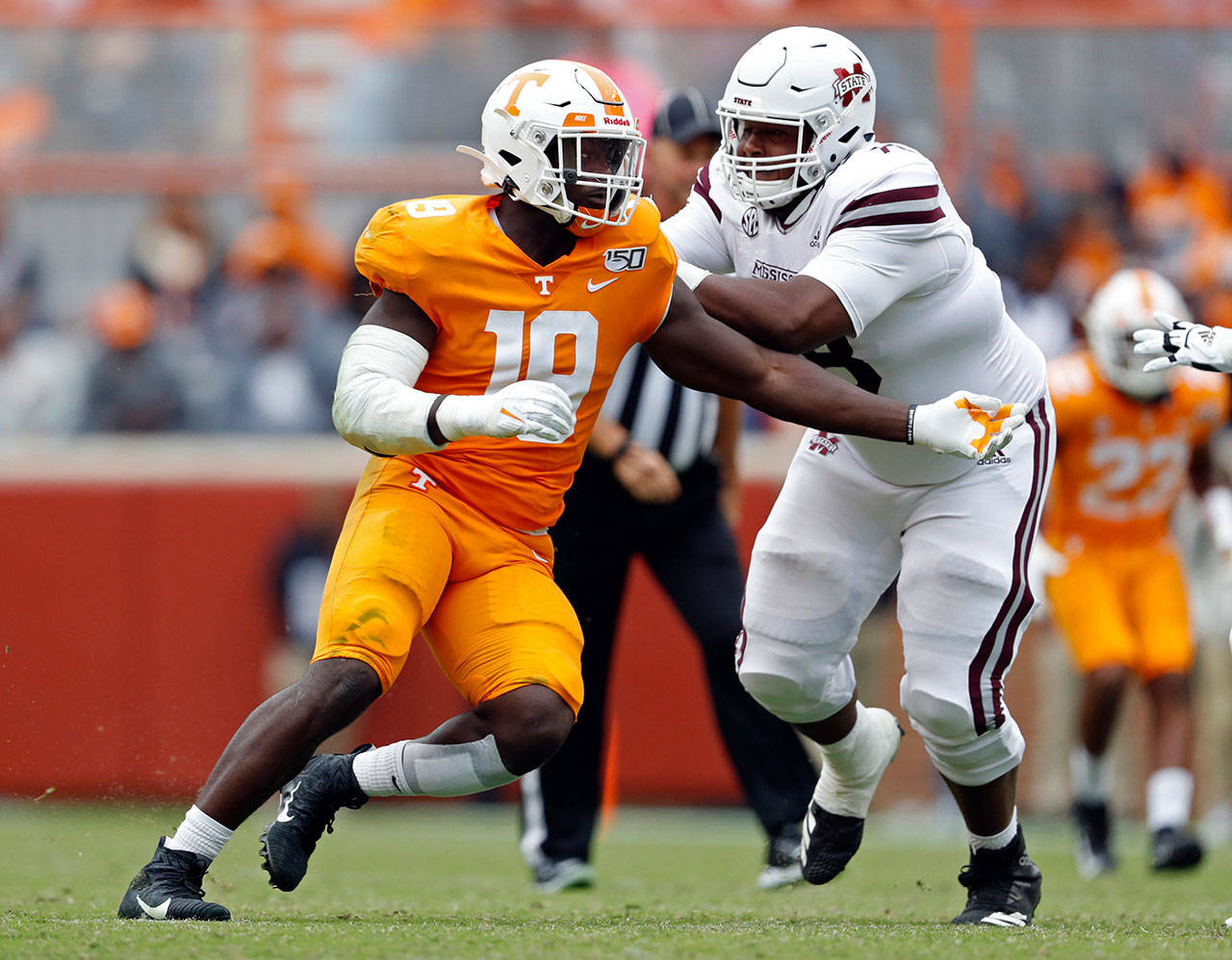 Tennessee linebacker Darrell Taylor (19) races to the quarterback during a game against Mississippi State on Oct. 12, 2019, in Knoxville, Tenn. (AP Photo/Wade Payne)