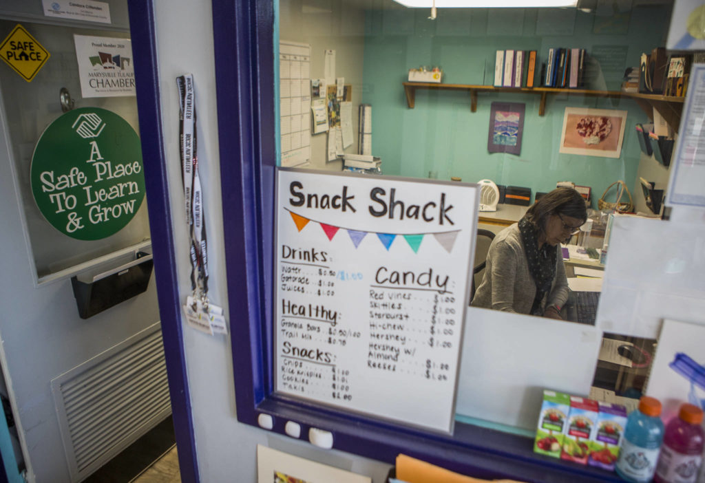 Candace Crittenden works in her office at the Marysville Boys & Girls Club. (Olivia Vanni / The Herald)
